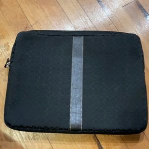 Coach laptop holder.